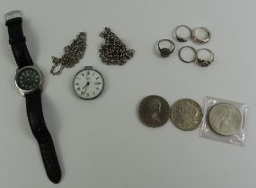 A Victorianox wristwatch, various rings, a Sekonda