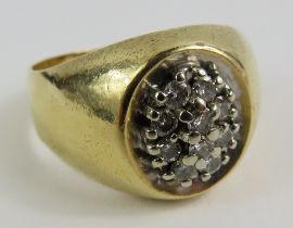 A gents diamond set ring, marked '14k', finger siz
