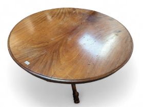 A Victorian mahogany breakfast table, the turned c
