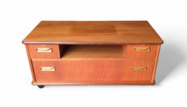 A mid 20th century low teak television cabinet, 92.5cm x 46cm x 41c