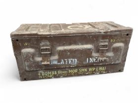A vintage metal ammunition box