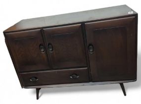 An Ercol dark elm sideboard, 114cm x 44cm x 83cm