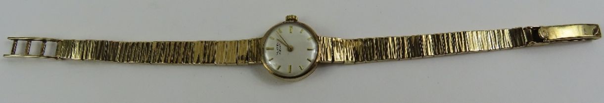 A ladies Vertex 9ct gold wristwatch, the round whi