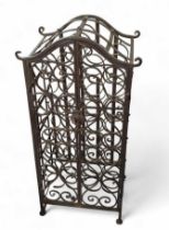 A wrought iron wine rack