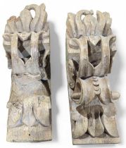 A pair of 19th century carved wood corbels