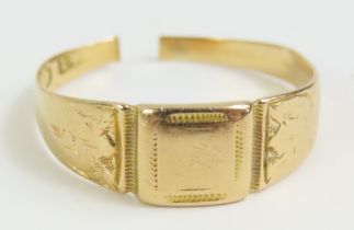 A gold ring with partial hallmark, cannot size,