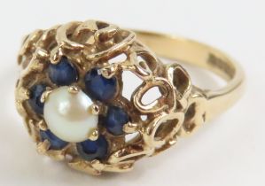A 9ct gold simulated pearl and sapphire cluster ri