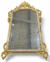 A decorative rectangular wall mirror with giltwood