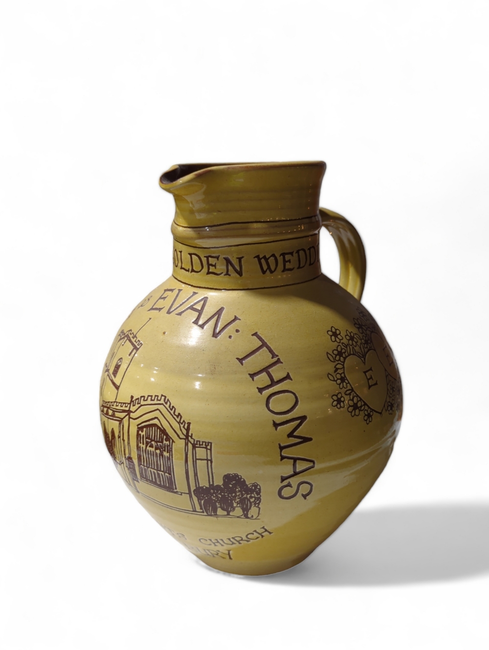 A Golden Wedding celebration jug, terracotta with