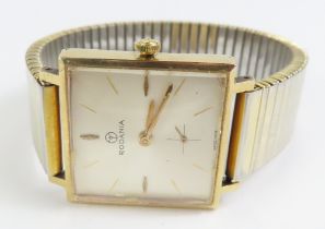 Rodania - a 9ct gold cased watch face, the square