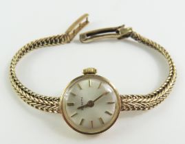 A ladies 9ct gold Zenith wristwatch, the small rou