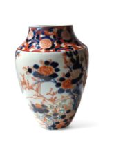 A Japanese Imari vase painted in typical palette w