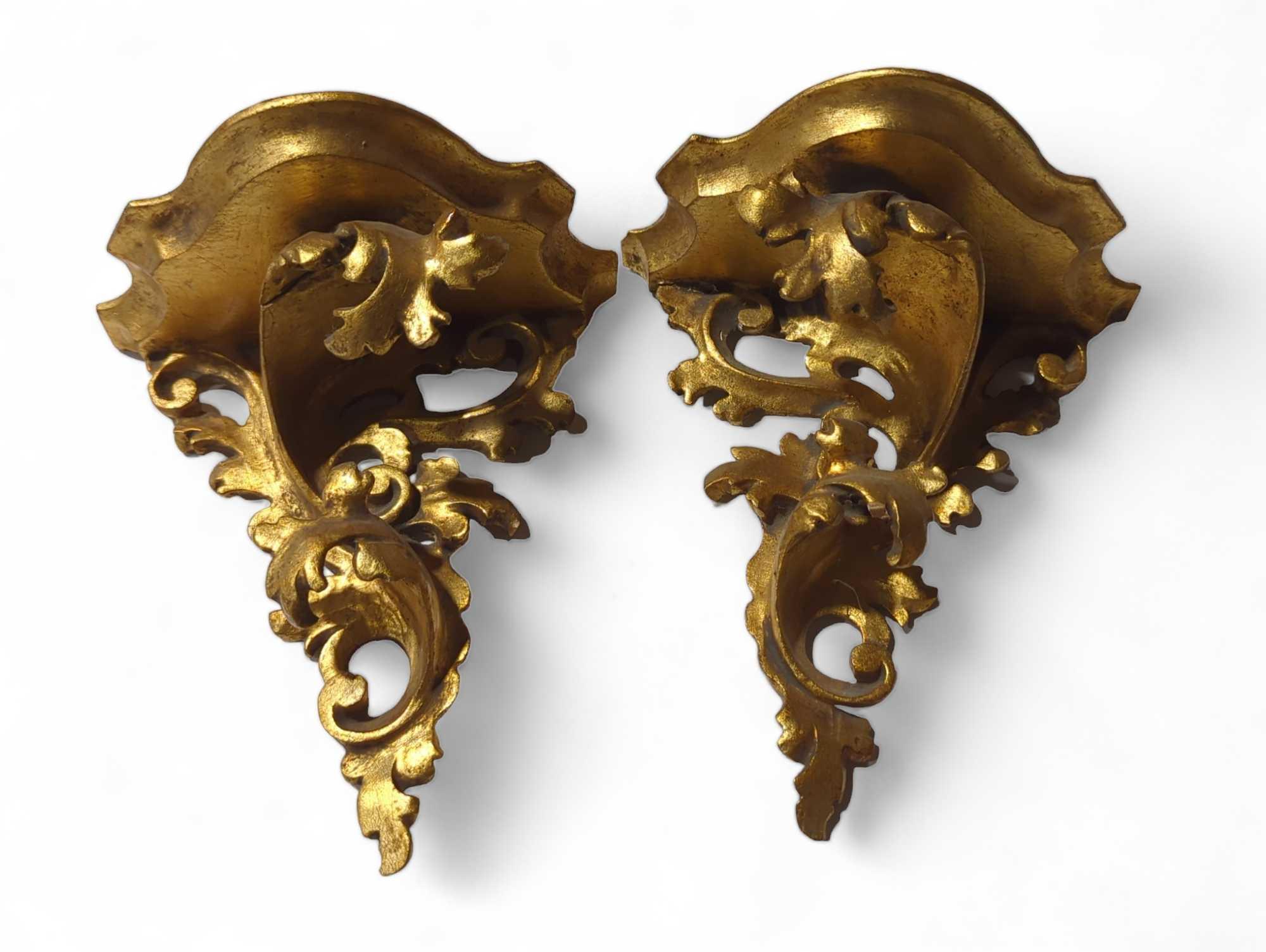 A pair of small giltwood rococo style wall bracket