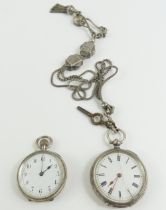 A small silver open faced pocket watch, together w