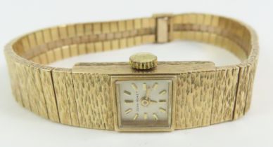 A ladies Jean Renet 9ct gold wrist watch, the whit