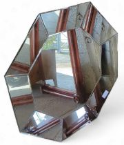 An octagonal wall mirror 91cms high