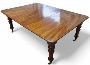 Victorian mahogany extending dining table with add