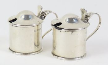 A pair of small George VI silver mustards of cylin