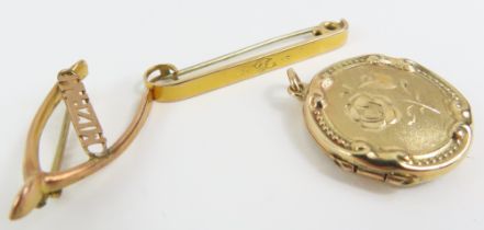 A round 9ct gold locket, a Mizpah horseshoe brooch