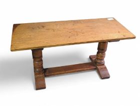 An oak refectory style coffee table 102cms wide