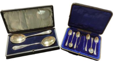 A cased set of six silver tea spoons with tongs an