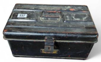 A black painted metal box with carrying handle and