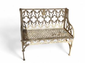 A heavy white painted metal garden seat, 97cms wide