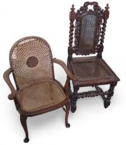 A beech framed open arm chair with cane back and s