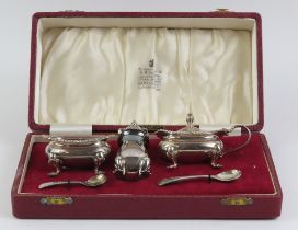 A Garrard cased silver cruet set comprising mustar