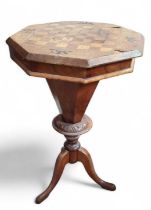 A Victorian inlaid walnut octagonal pedestal work