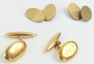 A pair of 15ct gold cufflinks, one side an oval an