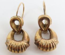 A pair of Victorian articulated drop earrings, wit