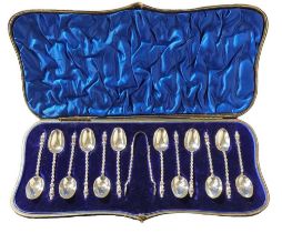 A cased set of apostle type teaspoons and pair of