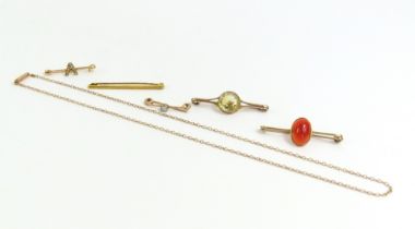 A small 9ct gold bar brooch set with a single opal