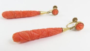 A pair of 20th century drop earrings, the orange s