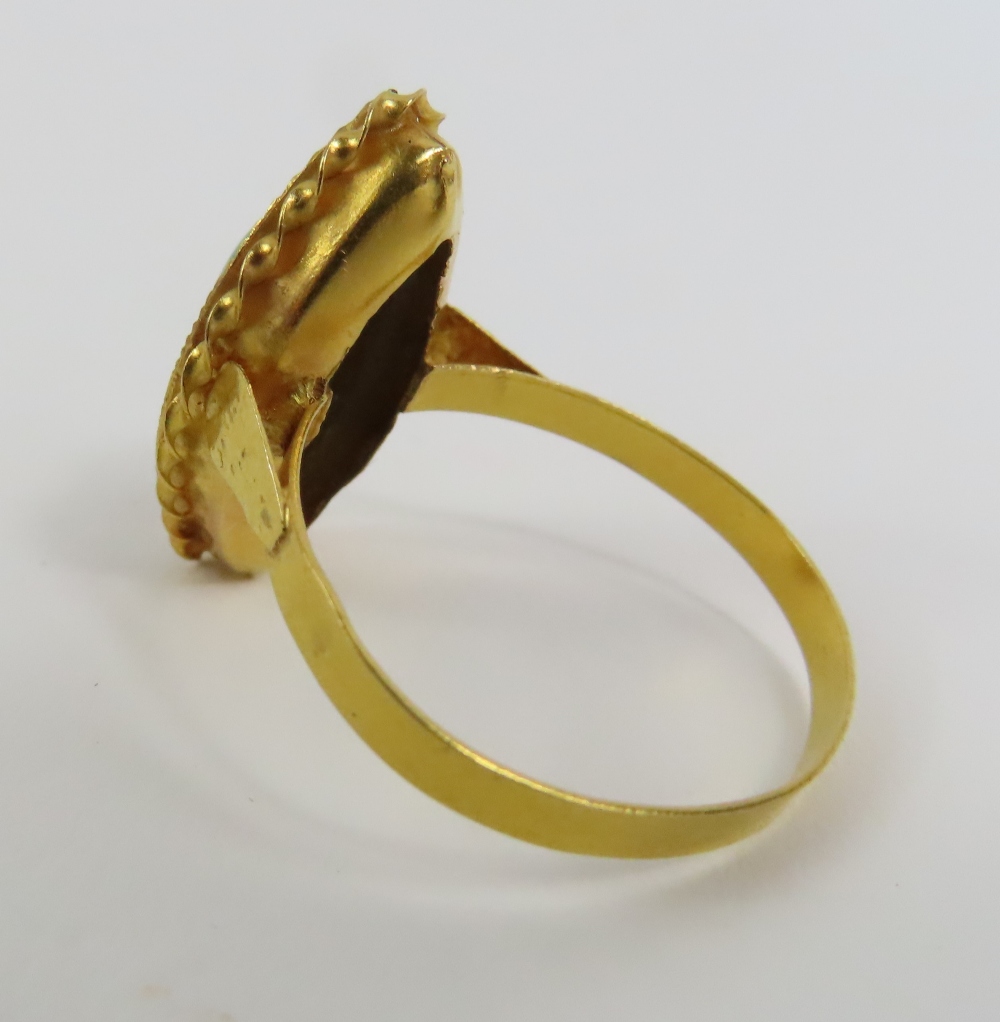 A 20th century design ring, the reconstituted turq - Image 4 of 5