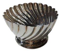 A small silver bowl, with swirling gadrooned boy a