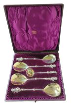 An unusual silver fruit serving set, comprising fo