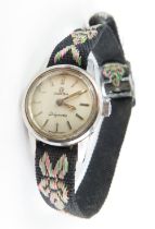 Omega - a vintage ladymatic, the round silvered di