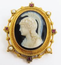 A finely carved Victorian revival cameo pendant br