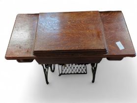 A vintage Singer machine treadle table