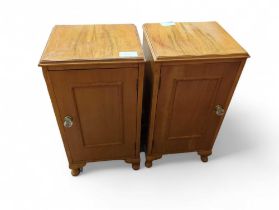 A pair of mid-20th century bedside cabinets, each