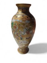 A Japanese Satsuma vase of baluster form and paint