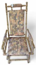 A 20th century American rocking chair, in a light