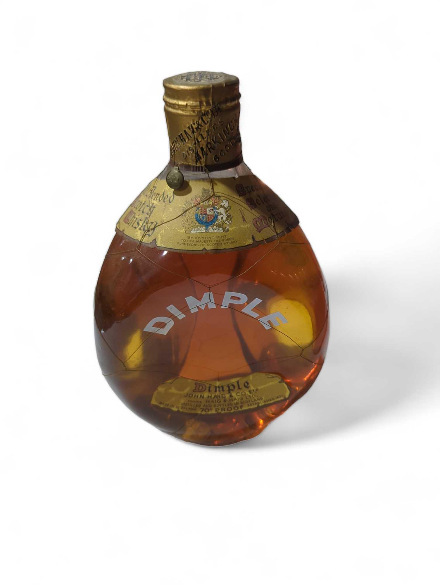 A bottle of Dimple scotch whisky