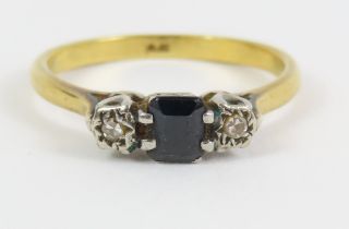 A sapphire and diamond three stone ring, marked '1