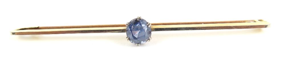 An early 20th century bar brooch, set with a light
