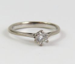 An 18ct white gold diamond solitaire ring, with ce