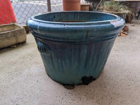 A blue/turquoise glazed pot, 34cm high