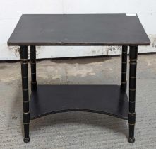 A Victorian aesthetic table, with two tiers, on fo
